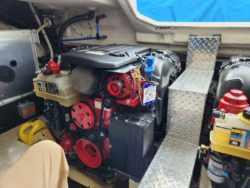 Slide: The Image of Engine room of 2022 Regal 38 Grande Coupe with visible components and equipment. - 39