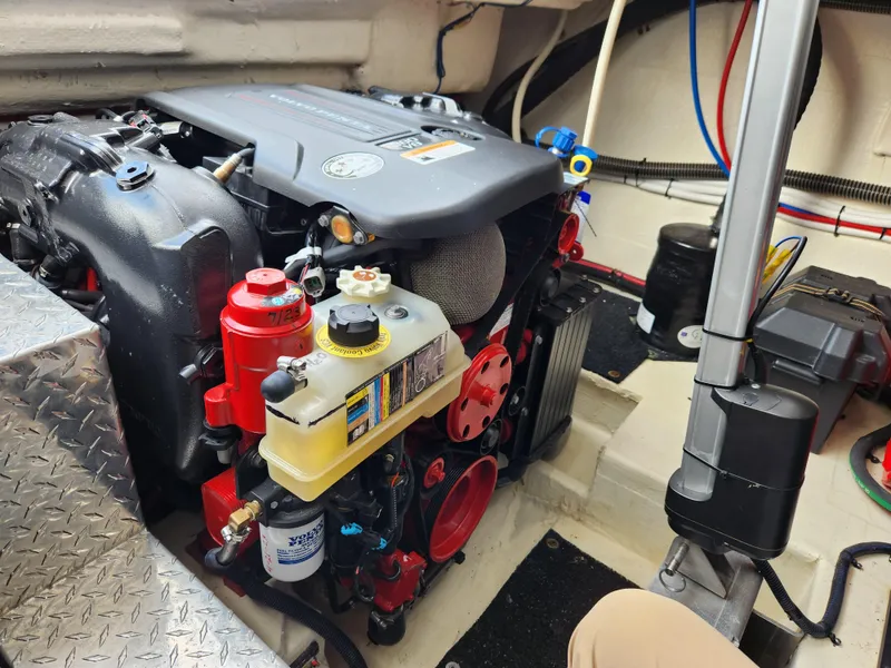 Slide: The Image of Engine compartment of 2022 Regal 38 Grande Coupe, showcasing detailed mechanical components. - 40