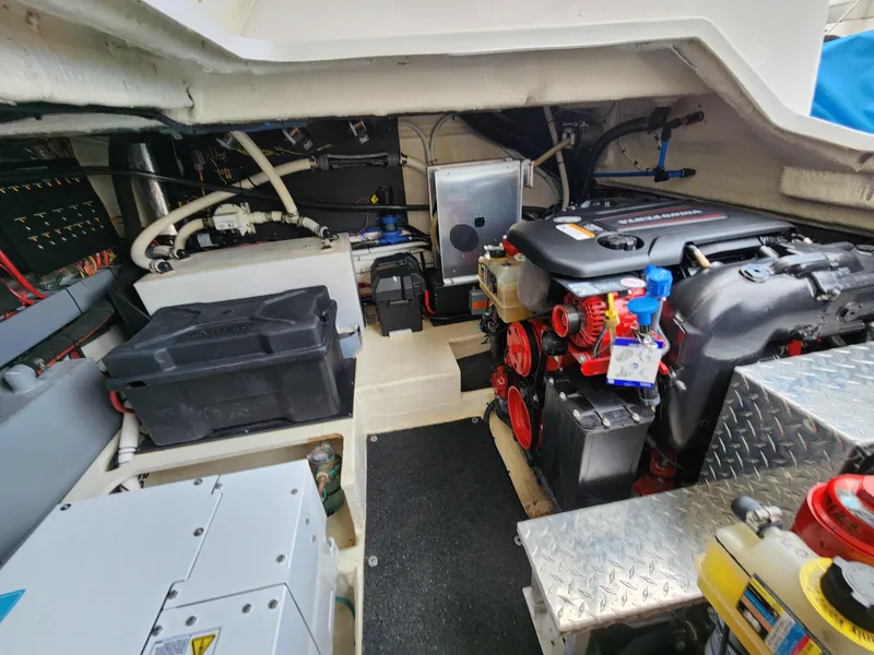 Slide: The Image of Engine room of 2022 Regal 38 Grande Coupe with visible components and wiring. - 41