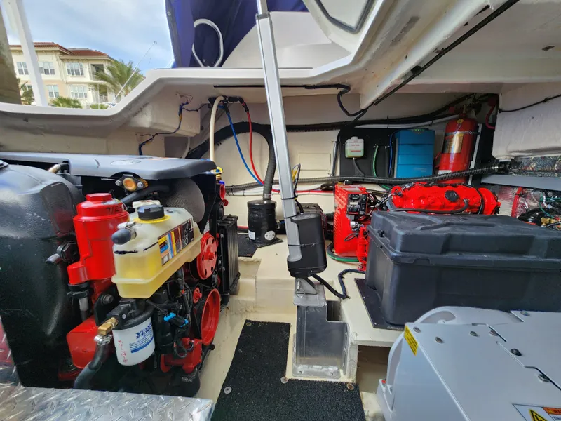 Slide: The Image of Engine room of 2022 Regal 38 Grande Coupe, showcasing mechanical components and systems. - 42