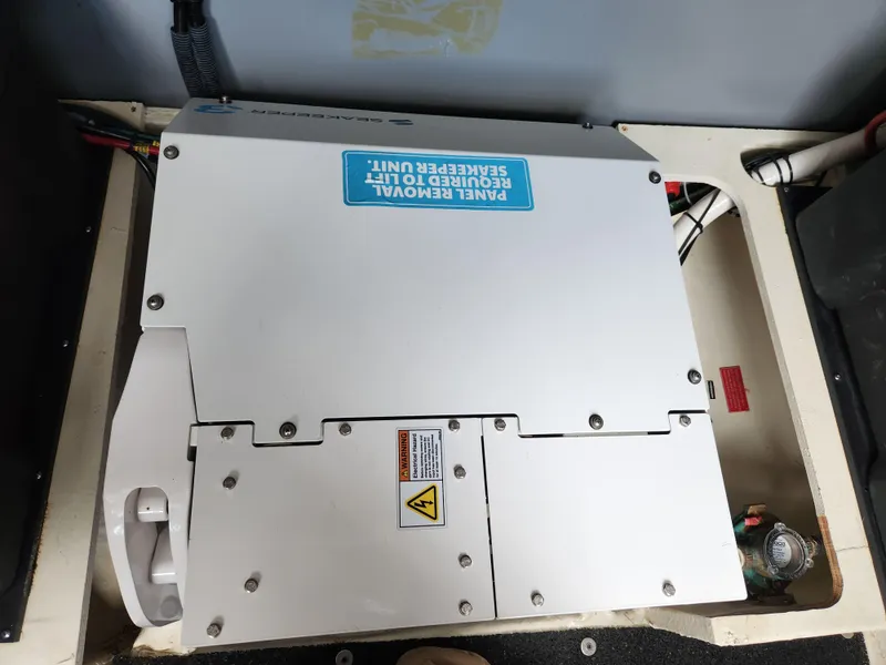 Slide: The Image of Engine compartment of 2022 Regal 38 Grande Coupe boat. - 43