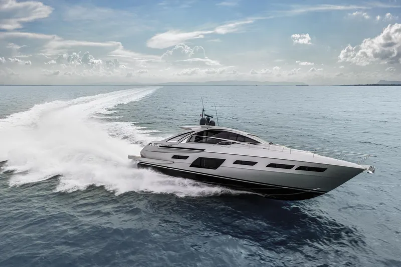 The Image of 2026 Pershing 7X yacht cruising on open sea under clear skies. - 0