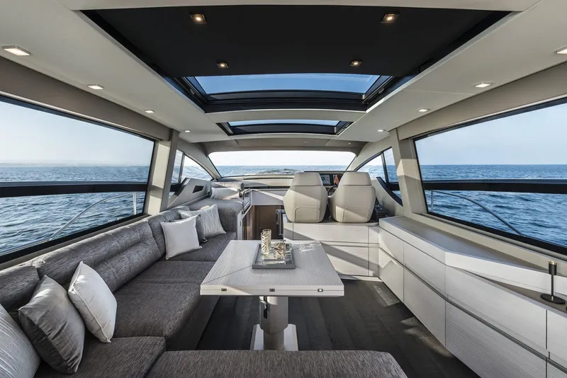 Slide: The Image of Luxurious interior of 2026 Pershing 7X yacht with ocean view and modern seating. - 15