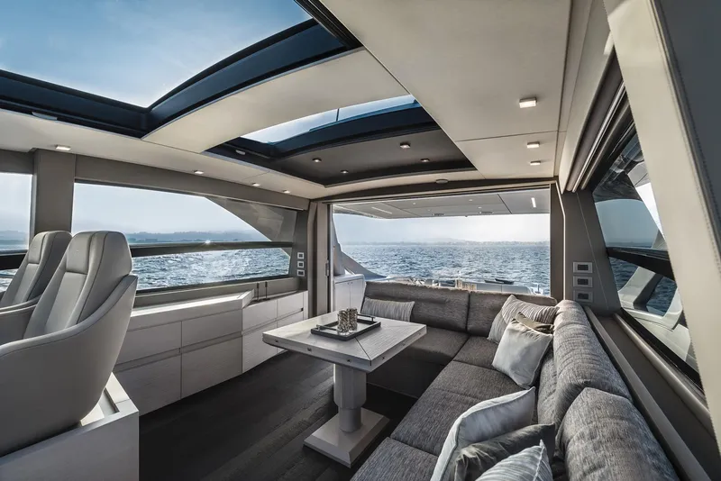 Slide: The Image of Luxurious interior of 2026 Pershing 7X yacht with ocean view and modern seating. - 16