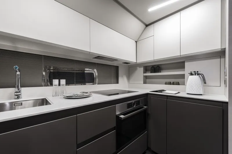 Slide: The Image of Modern kitchen in 2026 Pershing 7X yacht with sleek cabinetry and appliances. - 19