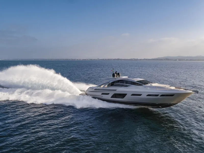 Slide: The Image of 2026 Pershing 7X yacht cruising swiftly on open water. - 2