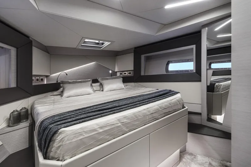 Slide: The Image of Luxurious bedroom interior of 2026 Pershing 7X yacht with modern design and elegant bedding. - 22