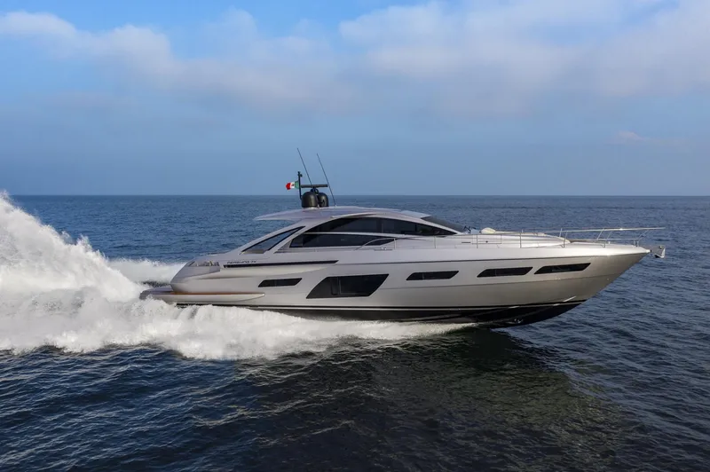 Slide: The Image of 2026 Pershing 7X yacht cruising on open sea under clear blue sky. - 3