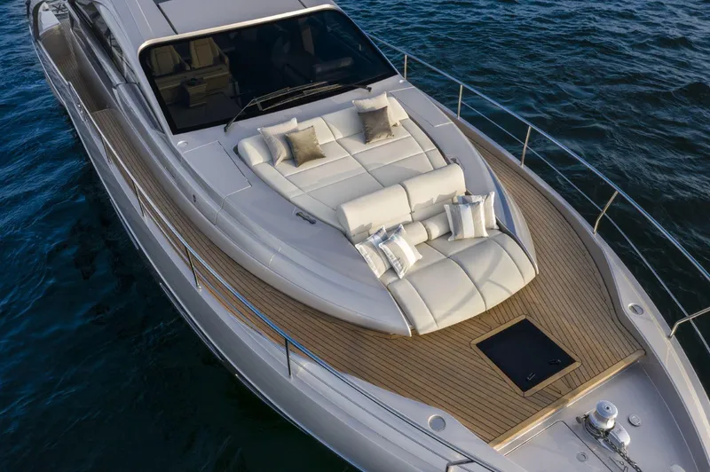 Slide: The Image of Luxurious 2026 Pershing 7X yacht with elegant deck and plush seating on the water. - 5