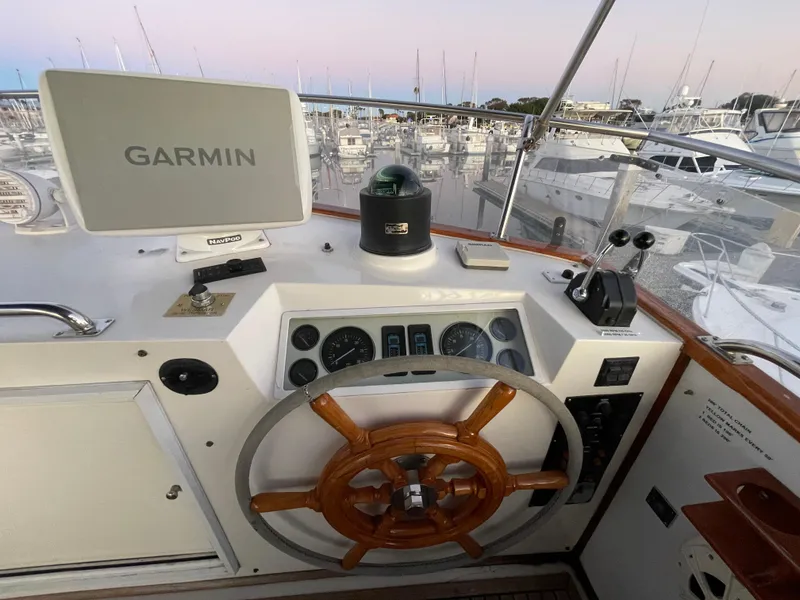 Slide: The Image of 1995 Grand Banks 49 Motoryacht helm with Garmin navigation system. - 17