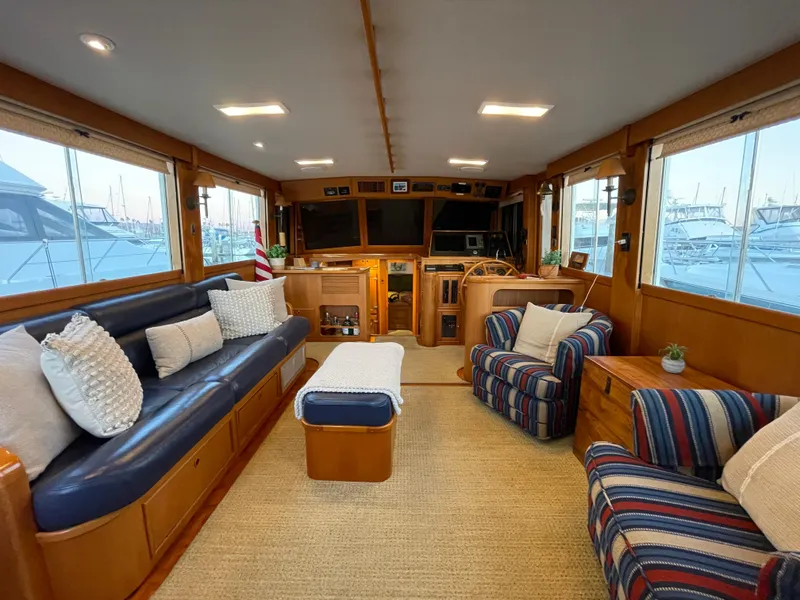 Slide: The Image of Interior of 1995 Grand Banks 49 Motoryacht with cozy seating and nautical decor. - 21