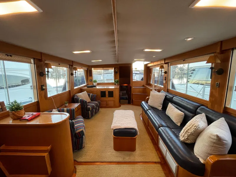 Slide: The Image of Luxurious interior of 1995 Grand Banks 49 Motoryacht with plush seating and elegant decor. - 23