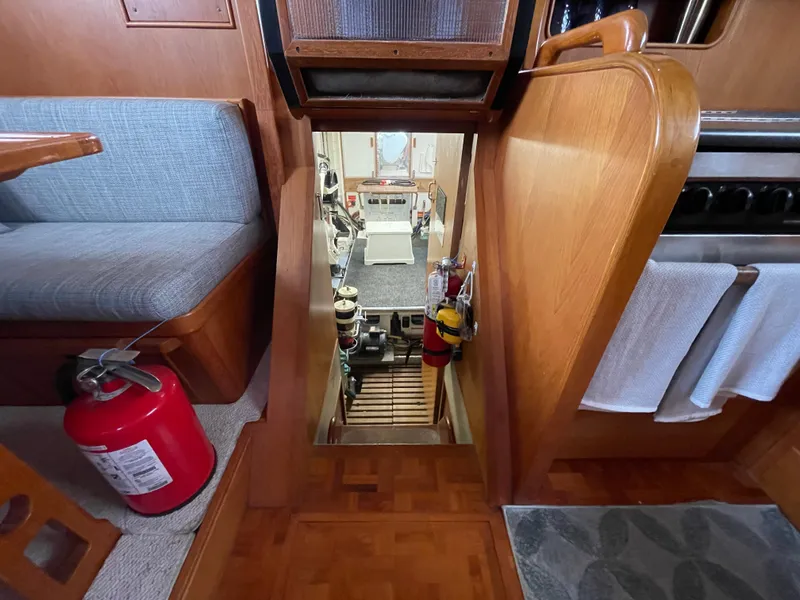 Slide: The Image of Interior view of 1995 Grand Banks 49 Motoryacht, showing stairs to engine room. - 34