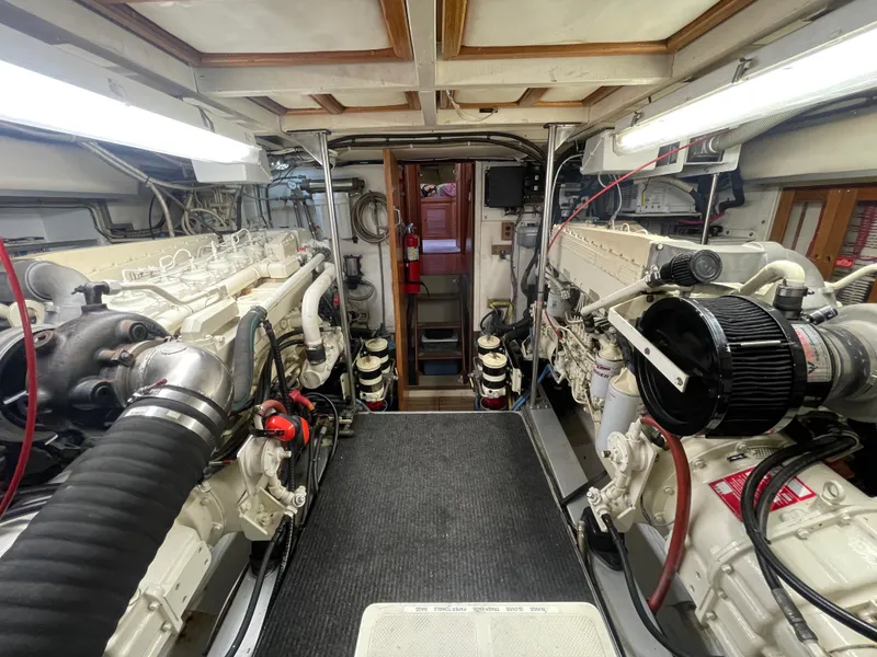 Slide: The Image of Engine room of 1995 Grand Banks 49 Motoryacht with dual engines and equipment. - 36