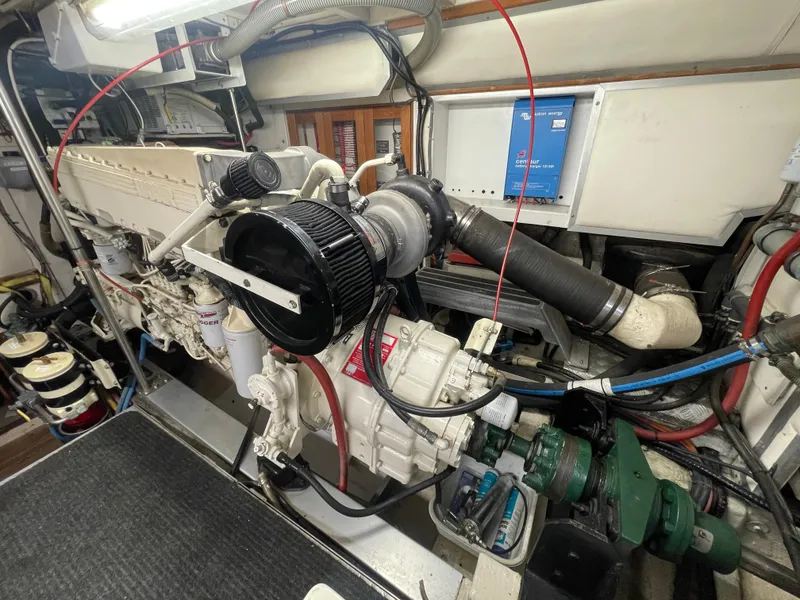 Slide: The Image of Engine room of 1995 Grand Banks 49 Motoryacht, showcasing mechanical components and systems. - 37