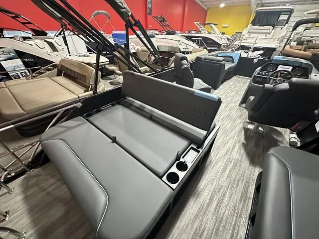 Slide: The Image of 2025 Godfrey Pontoons Sweetwater 2286 SFL interior with modern seating and sleek design. - 10