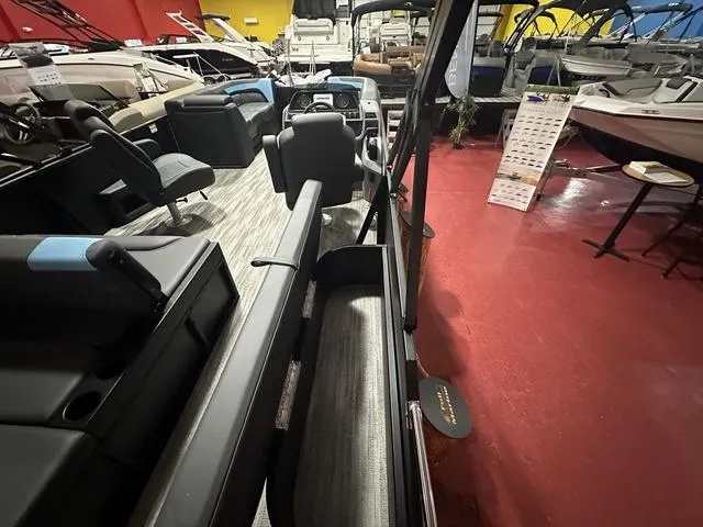 Slide: The Image of 2025 Godfrey Sweetwater 2286 SFL pontoon interior with sleek seating and modern design. - 11