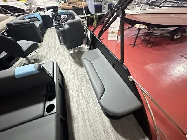 Slide: The Image of 2025 Godfrey Sweetwater 2286 SFL pontoon interior with sleek seating and modern design. - 12