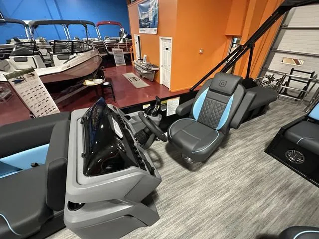 Slide: The Image of 2025 Godfrey Sweetwater 2286 SFL GTP pontoon interior with sleek seating and modern design. - 18