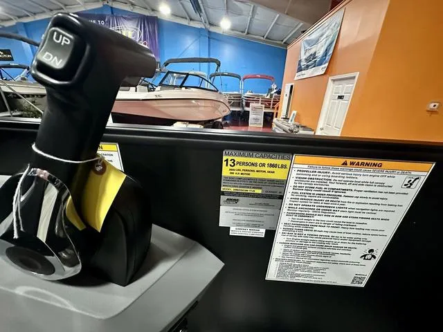 Slide: The Image of 2025 Godfrey Pontoons Sweetwater 2286 SFL GTP interior seating, featuring modern design and blue accents. - 6