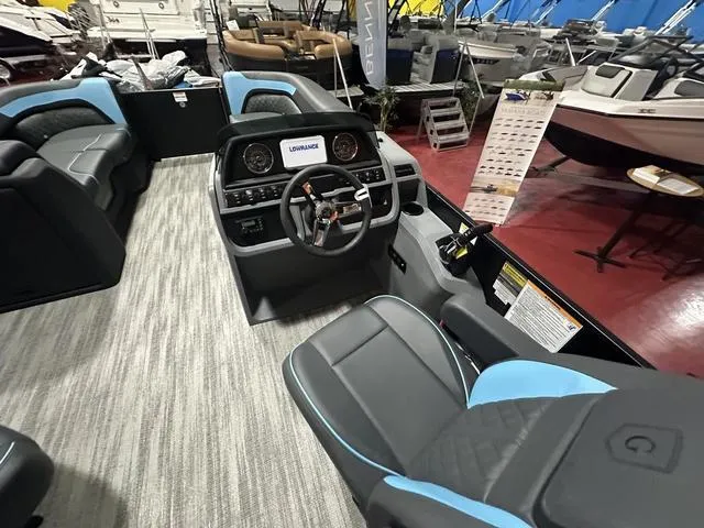 Slide: The Image of 2025 Godfrey Pontoons Sweetwater 2286 SFL GTP interior with modern helm and seating. - 8