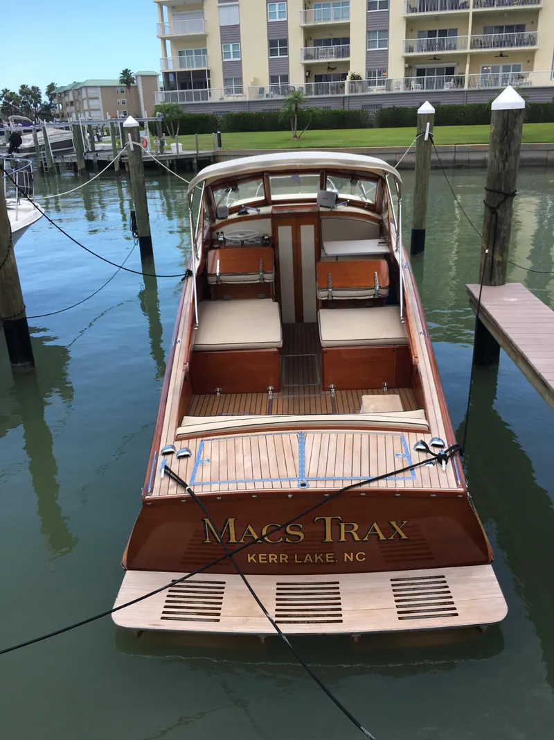 Slide: The Image of 1960 Prowler Semi-enclosed boat docked, wooden deck, named "Mac's Trax," Kerr Lake, NC. - 15
