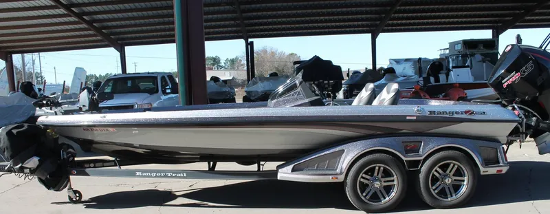 Slide: The Image of 2020 Ranger Z521L bass boat in a covered storage area. - 1