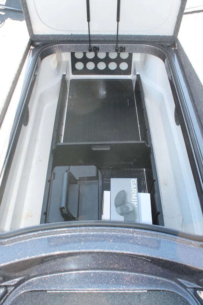 Slide: The Image of 2020 Ranger Z521L storage compartment with Garmin box inside. - 11
