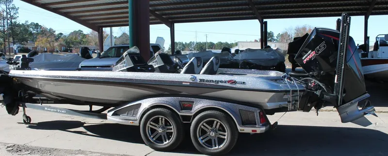 Slide: The Image of 2020 Ranger Z521L boat with trailer, parked under a shelter. - 21