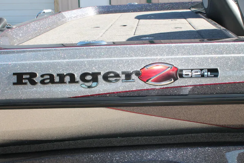 Slide: The Image of 2020 Ranger Z521L boat logo on a metallic surface. - 26