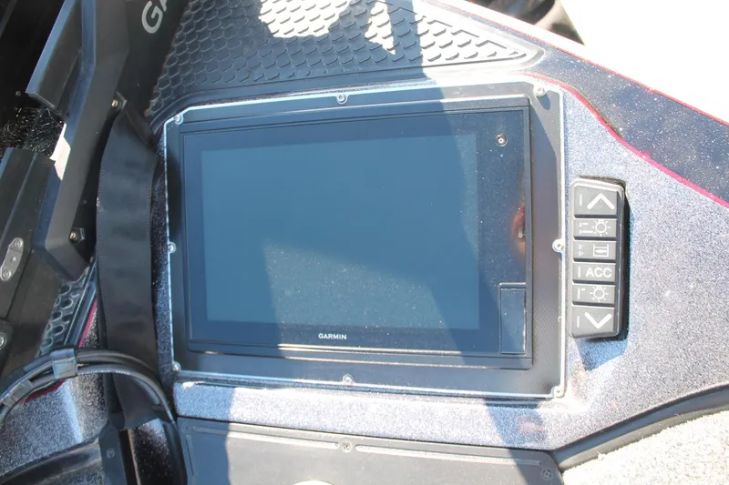 Slide: The Image of Garmin display on 2020 Ranger Z521L boat dashboard with control buttons. - 29