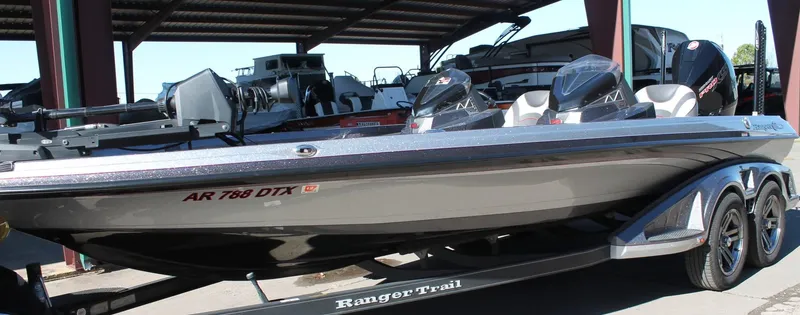 Slide: The Image of 2020 Ranger Z521L bass boat on trailer in storage facility. - 32