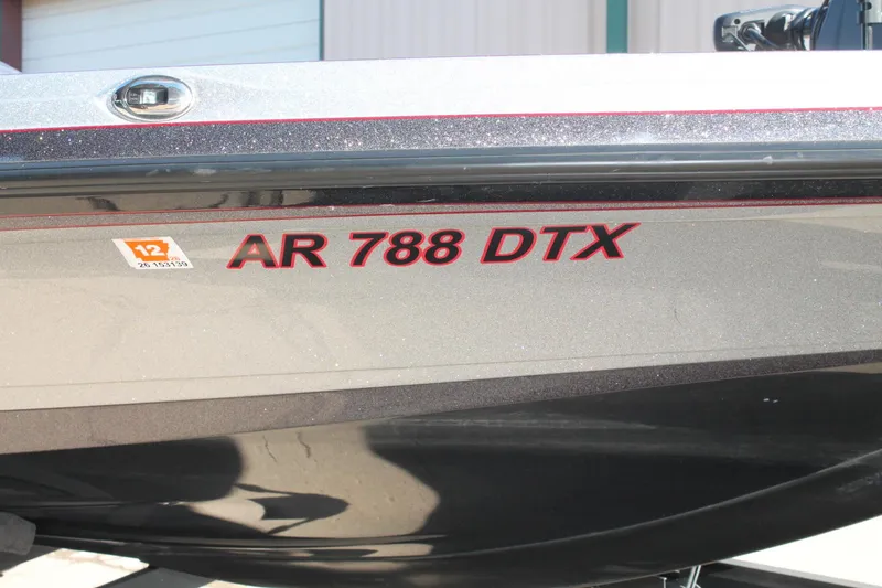 Slide: The Image of 2020 Ranger Z521L boat with registration AR 788 DTX displayed on the side. - 4