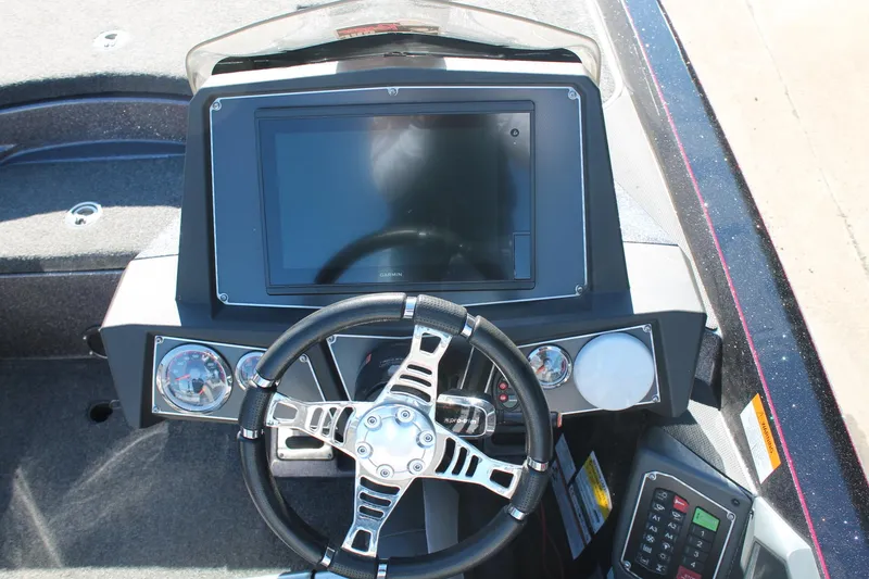 Slide: The Image of 2020 Ranger Z521L boat dashboard with steering wheel and digital display. - 6