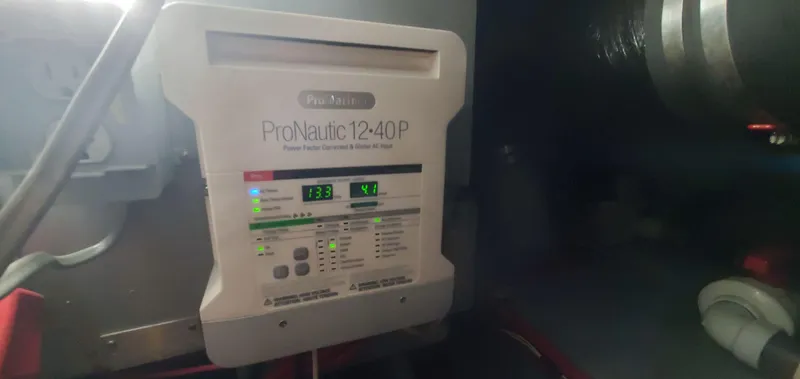 Slide: The Image of ProNautic 12-40P marine battery charger in 2001 Sea Ray 400 Sedan Bridge. - 74