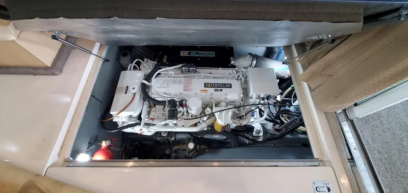 Slide: The Image of Engine compartment of 2001 Sea Ray 400 Sedan Bridge yacht. - 75
