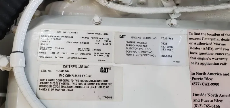 Slide: The Image of Caterpillar engine specifications on a 2001 Sea Ray 400 Sedan Bridge yacht. - 81