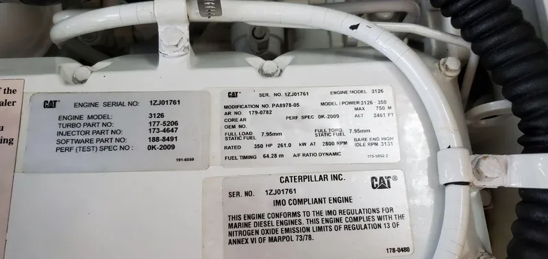 Slide: The Image of Caterpillar engine specifications on a 2001 Sea Ray 400 Sedan Bridge. - 83