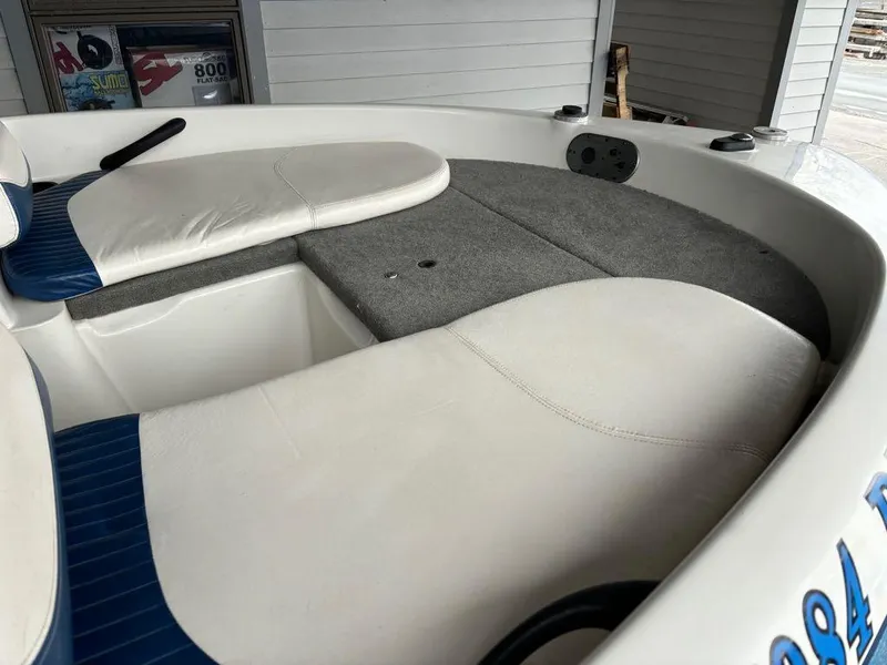 Slide: The Image of 2007 Nitro 189 Sport boat interior with white and blue seating. - 14
