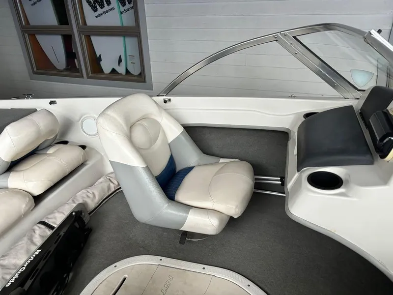 Slide: The Image of Interior of 2007 Nitro 189 Sport boat with white and gray seating. - 3