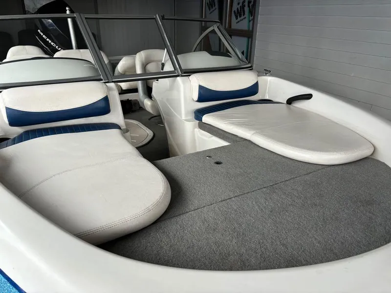 Slide: The Image of 2007 Nitro 189 Sport boat interior with white and blue seating. - 8
