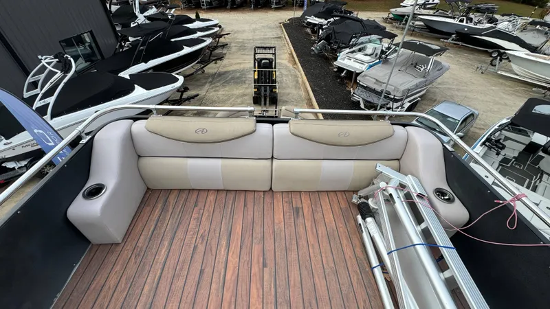 Slide: The Image of Avalon 2785 Paradise 2015 boat interior with wood flooring and cushioned seating. - 33
