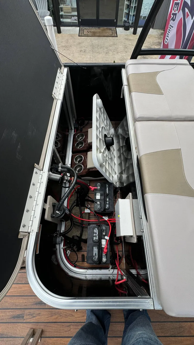 Slide: The Image of 2015 Avalon 2785 Paradise boat interior showing battery compartment and wiring. - 34