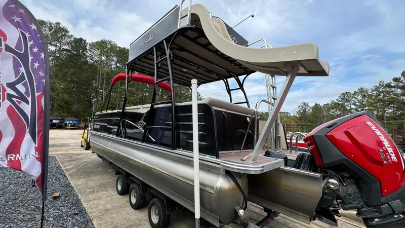 Slide: The Image of 2015 Avalon 2785 Paradise pontoon boat with slide and Evinrude motor. - 4