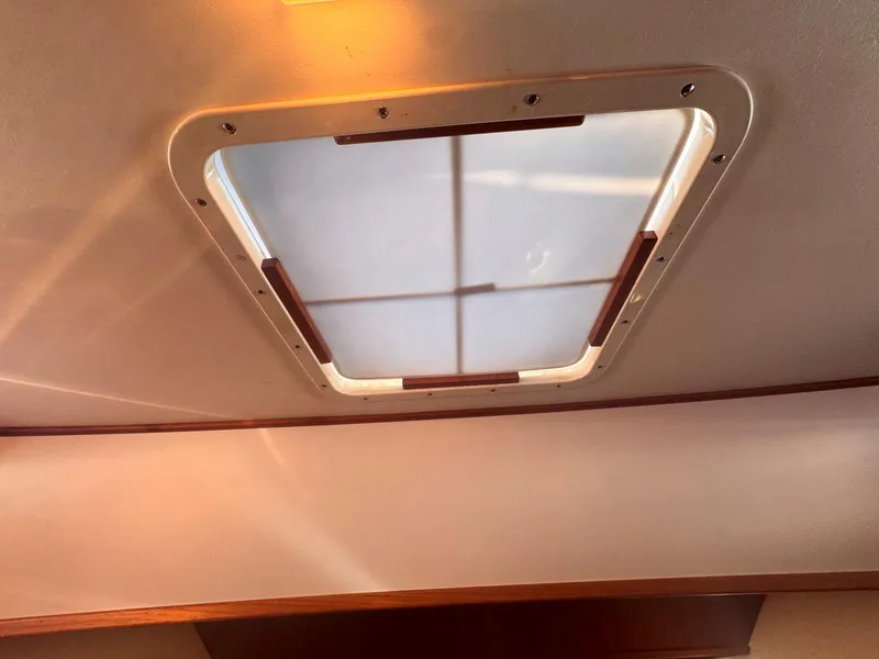 Slide: The Image of Ceiling hatch of 1999 Monk 36 Trawler with natural light. - 33