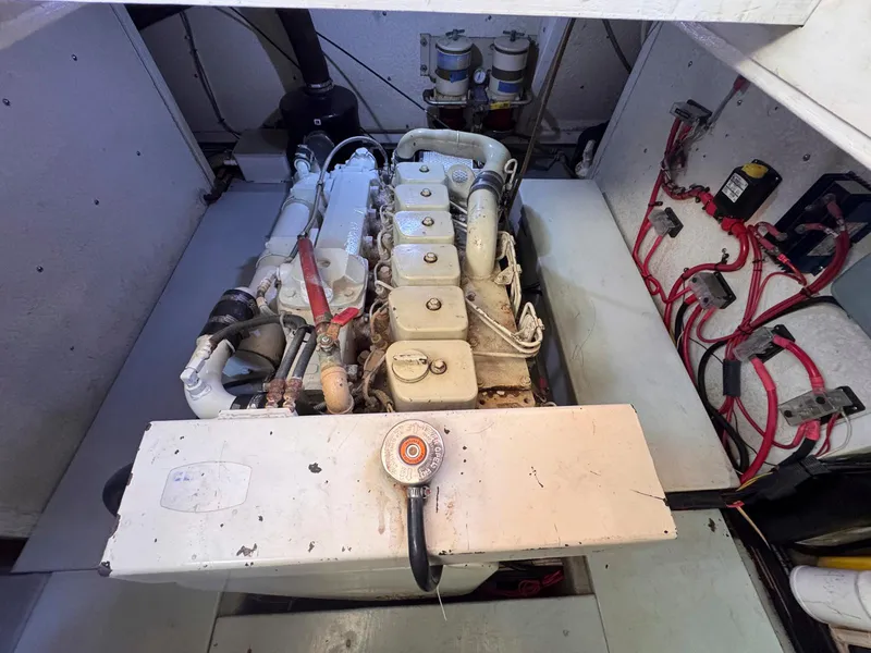 Slide: The Image of Engine room of 1999 Monk 36 Trawler with visible wiring and components. - 40