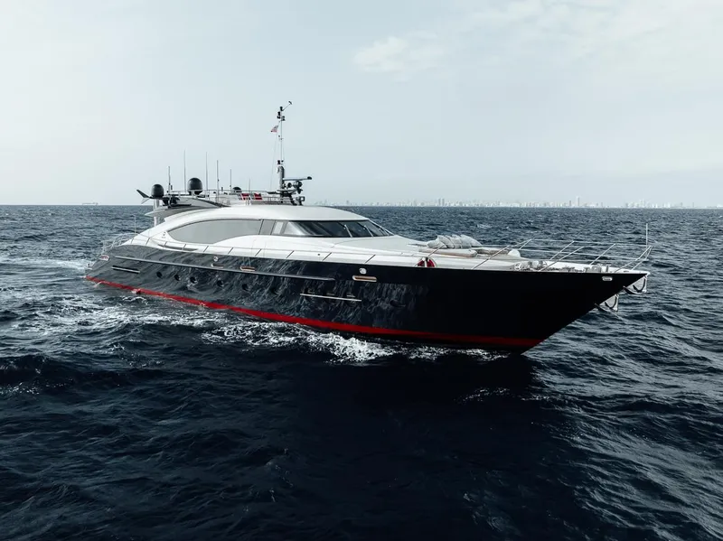 Slide: The Image of 2006 Palmer Johnson Express yacht cruising on open sea. - 13