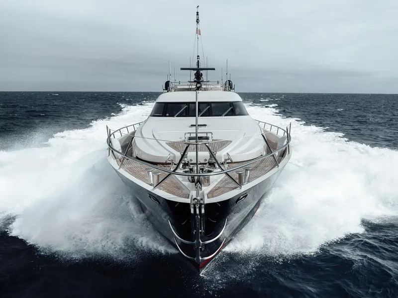 Slide: The Image of 2006 Palmer Johnson Express yacht cruising through ocean waves. - 14