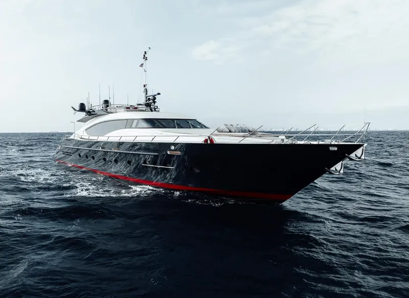 Slide: The Image of Luxury 2006 Palmer Johnson Express yacht cruising on open sea. - 16