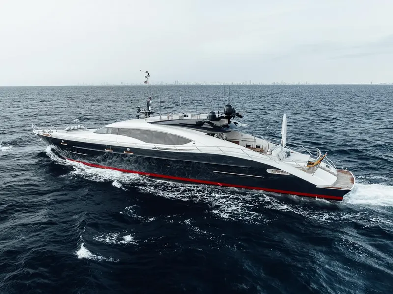 Slide: The Image of 2006 Palmer Johnson Express yacht cruising on open sea, sleek design, luxury vessel. - 17
